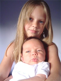 livy holding mikey