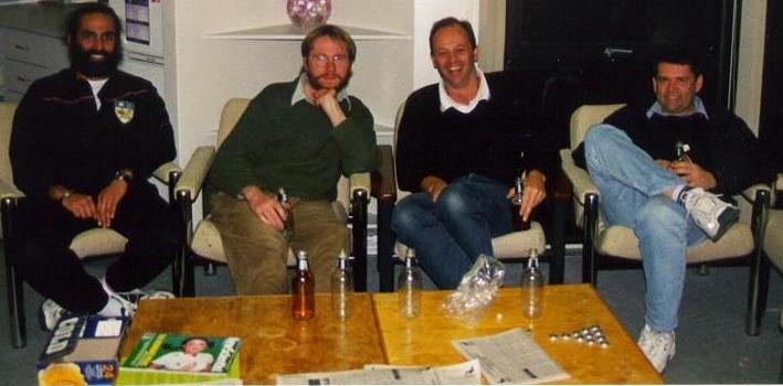 Four guys drinking beer.